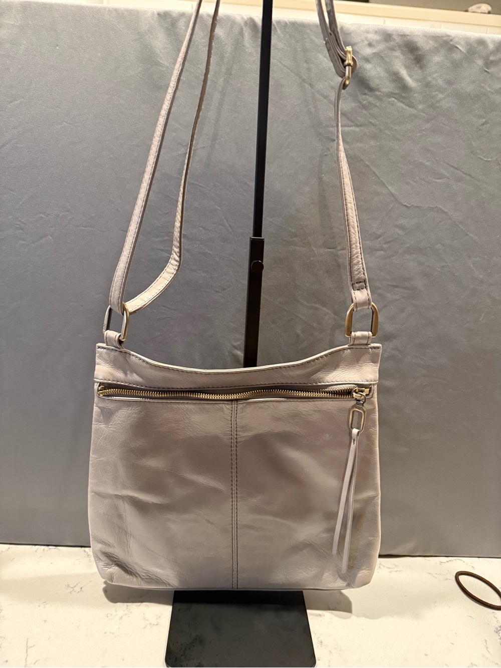 HOBO Pale Gray Leather Crossbody with Gold Hardware